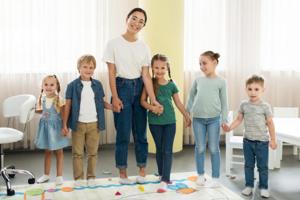 kids with the instructor at a creche facility 
