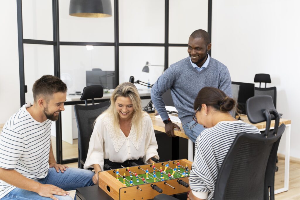 shot of professionals from diverse backgrounds enjoying their break in the coworking space.