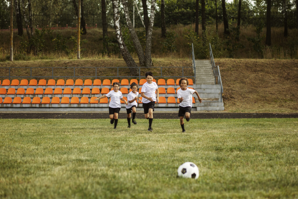 kids playing in the sports amenities provided in the gated community